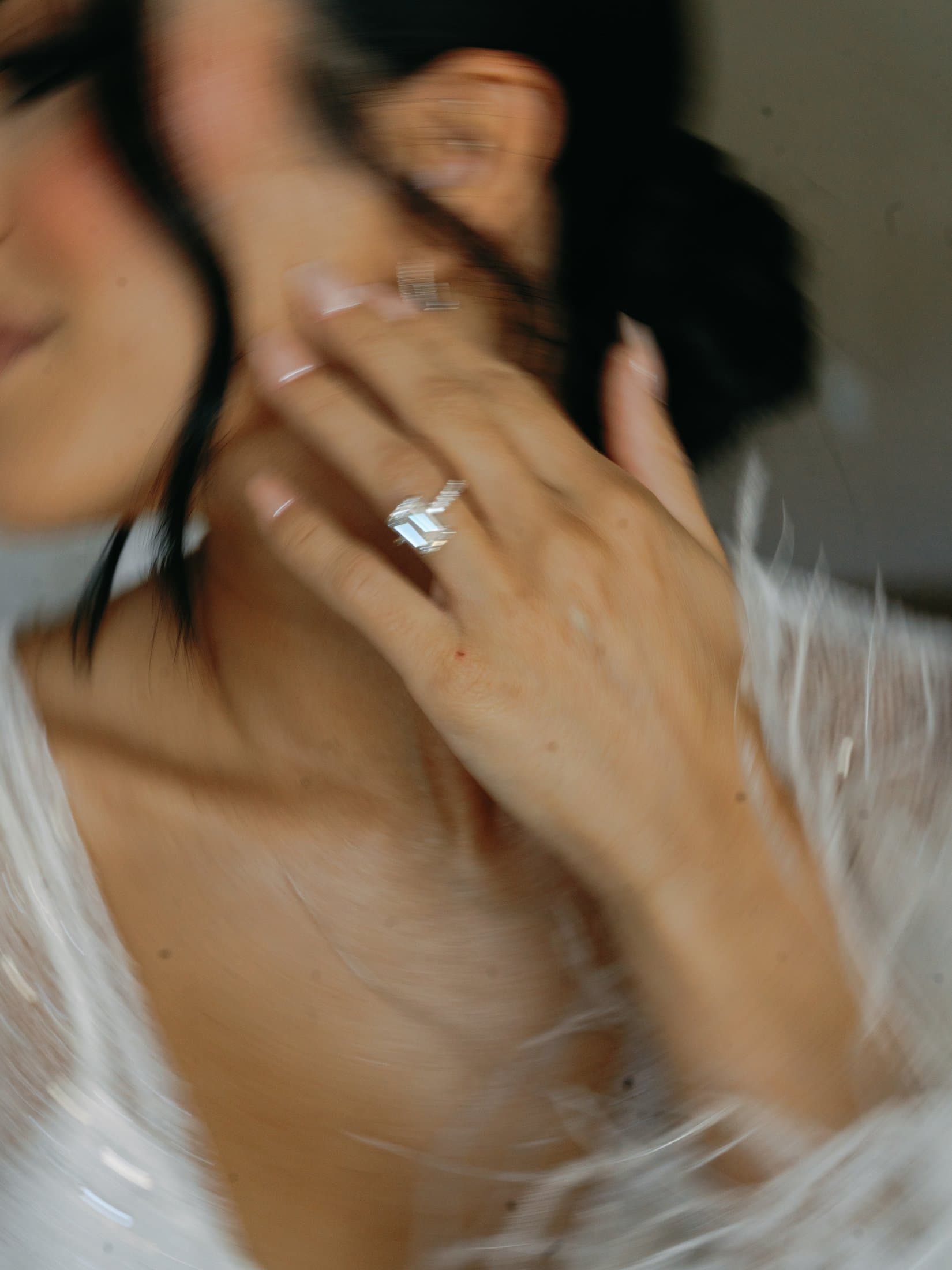 Soft motion portrait of bride and her ring
